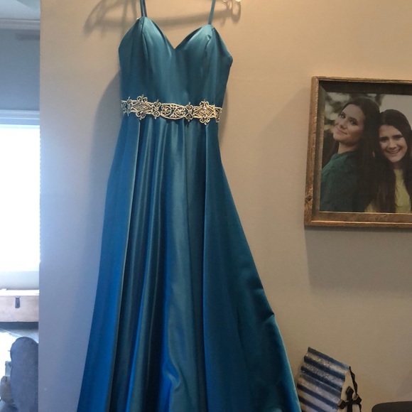 A turquoise pageant dress
